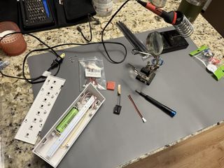 Solar gutter light disassembled, ready to begin the build