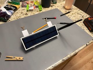 Finished solar Meshtastic node, fully assembled